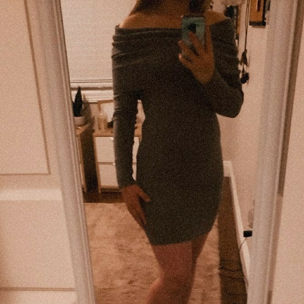 Beautiful grey over the shoulder sweater dress.